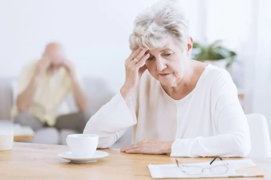 elderly woman with dementia is stressed after forgetfulness