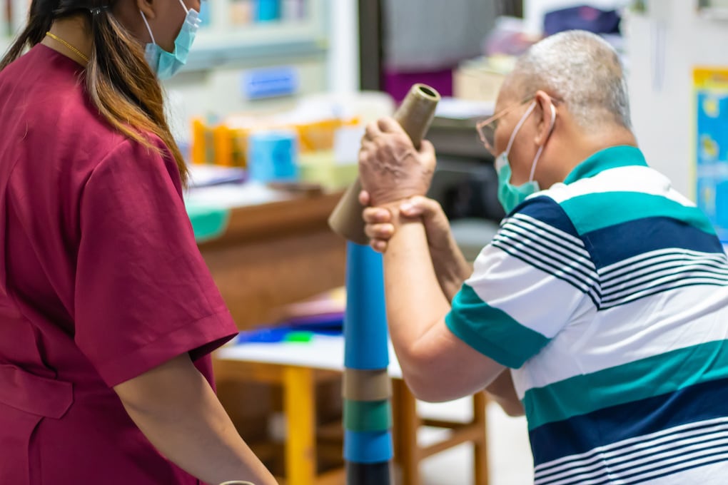 Occupational vs. physical therapy: hand function training in stroke patient by using stacking cone at a therapy room in the hospital