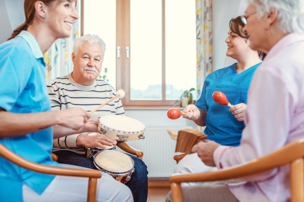 group of people do music therapy for cognitive ability