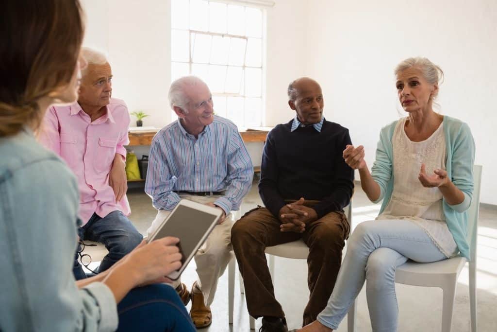 support group for caregivers meet and talk about stress