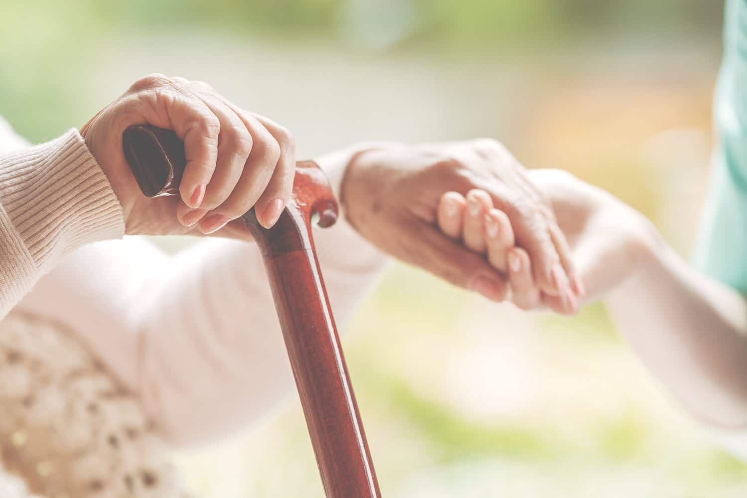 transition to memory care holding hands