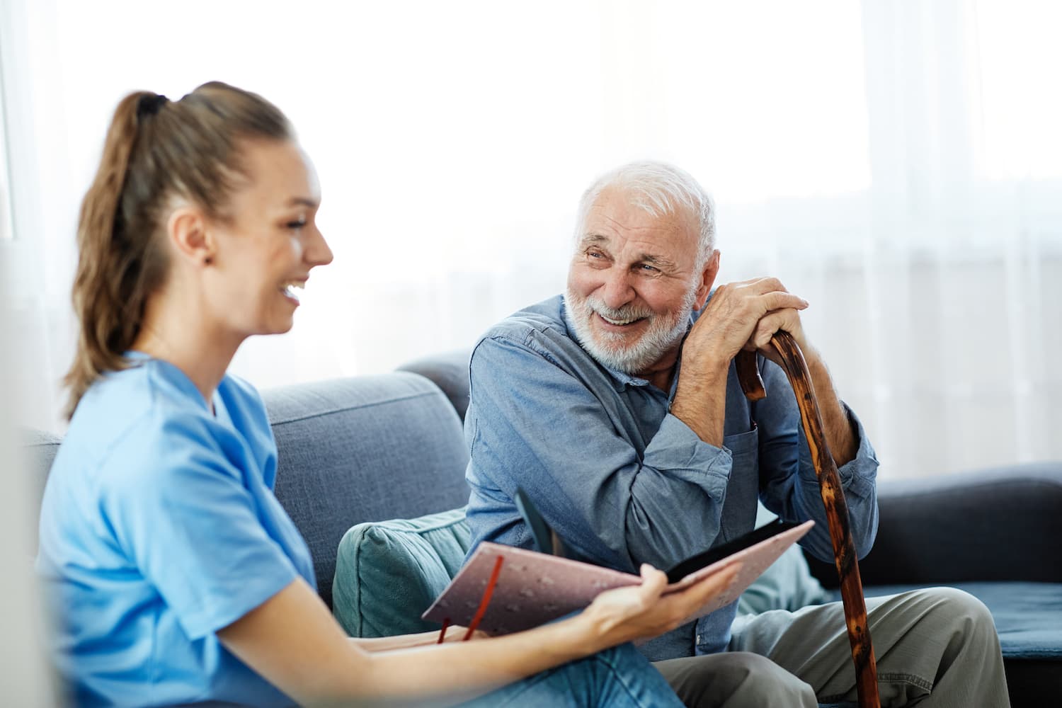 what to look for in a memory care facility reading and smiling