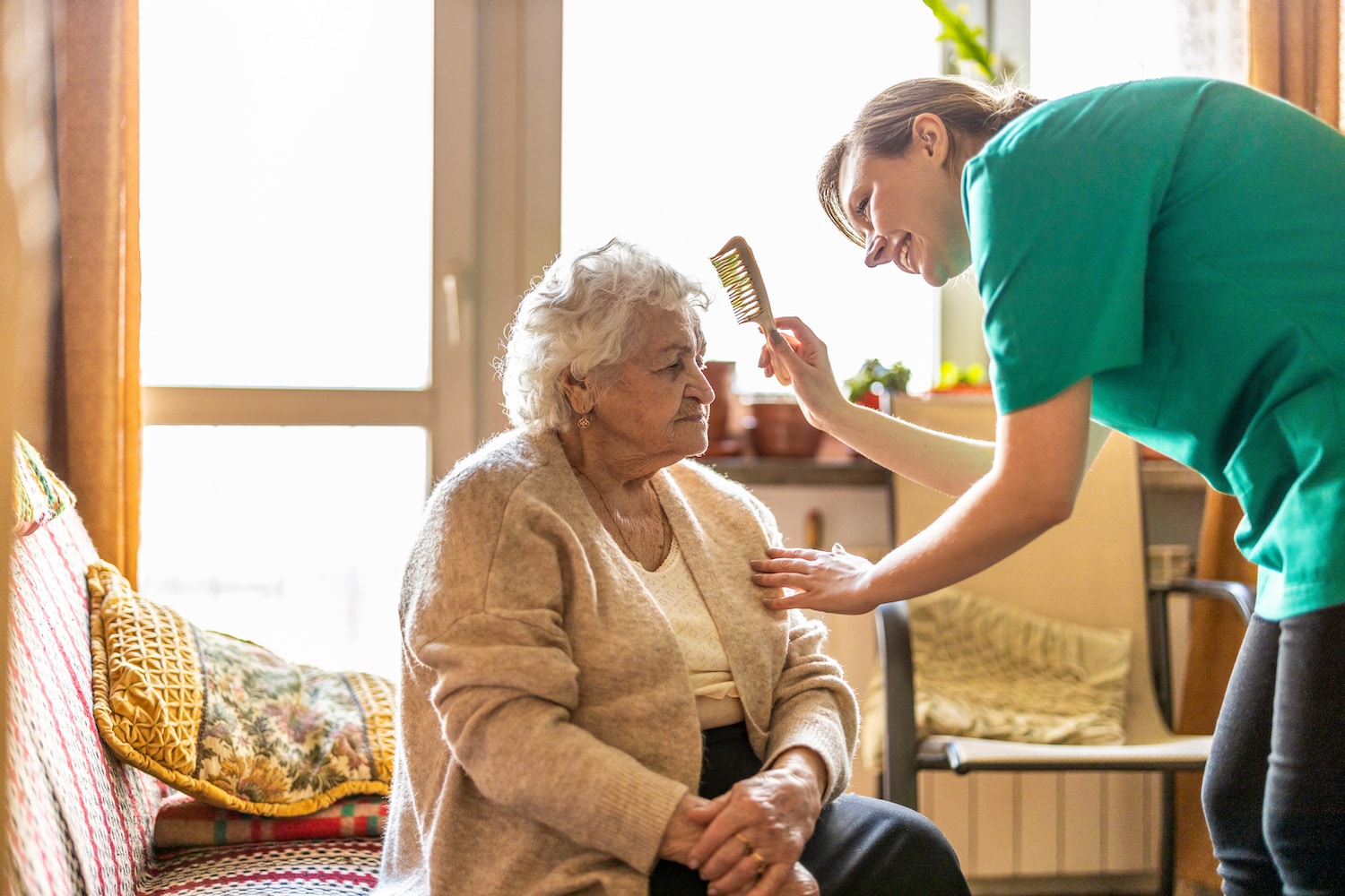 average cost of in-home dementia care nurse brushing hair