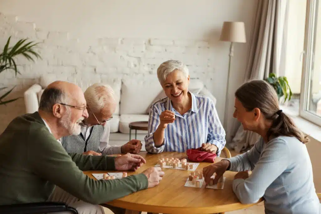 residents in nursing home assisted living playing game