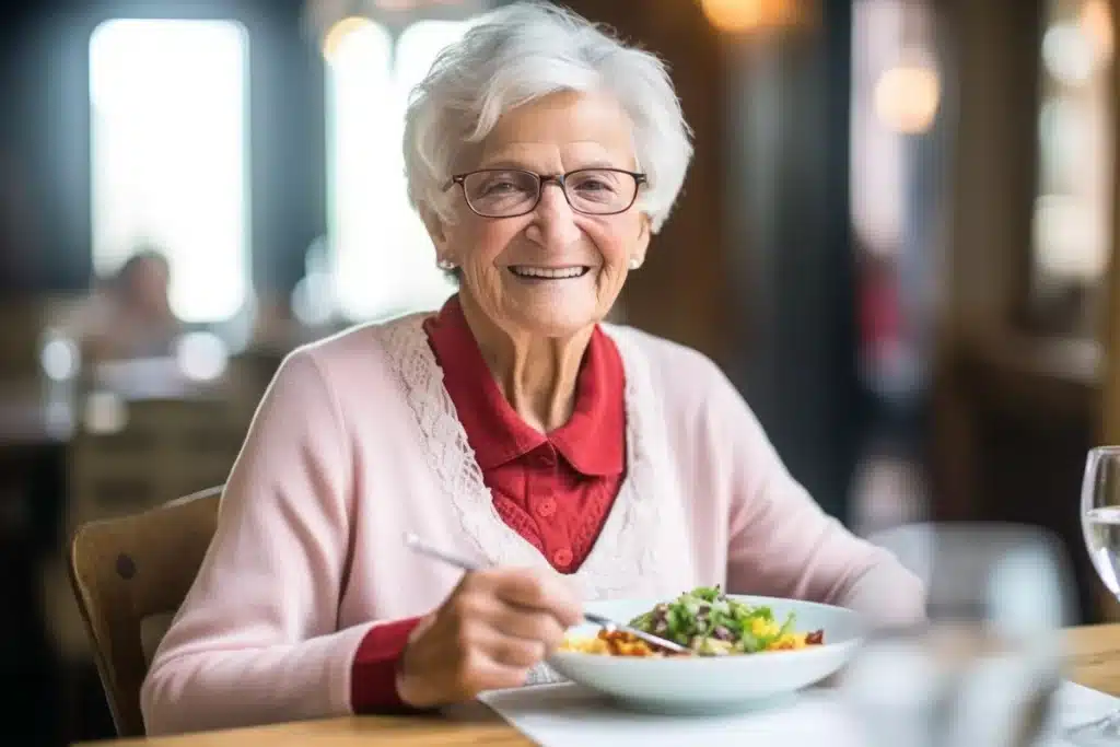 smiling elderly senior having meal
