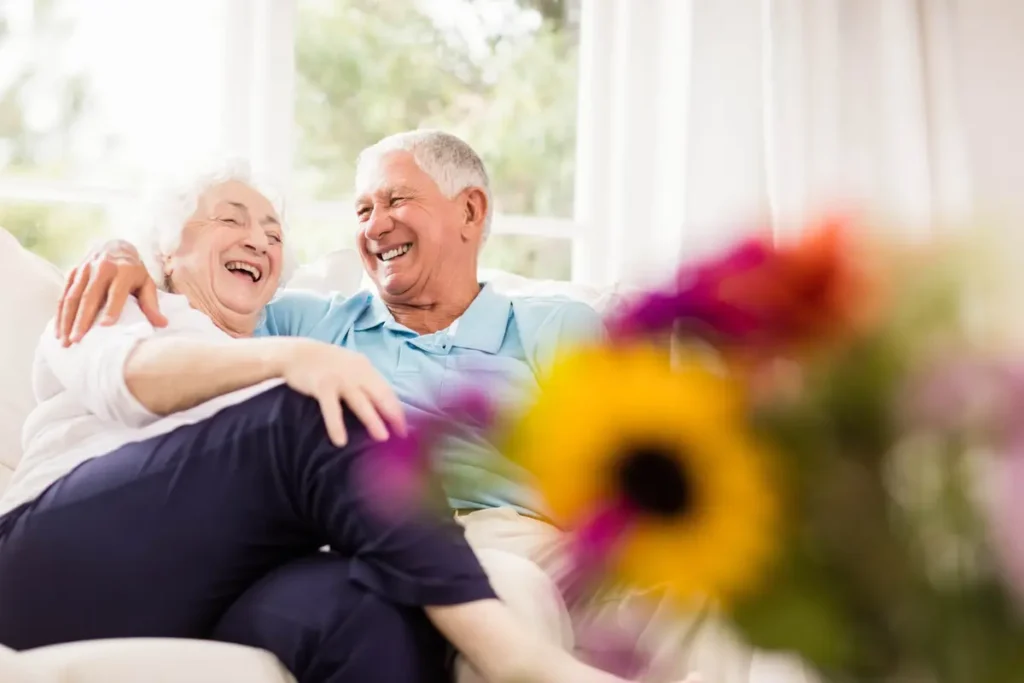 elderly couple and flowers