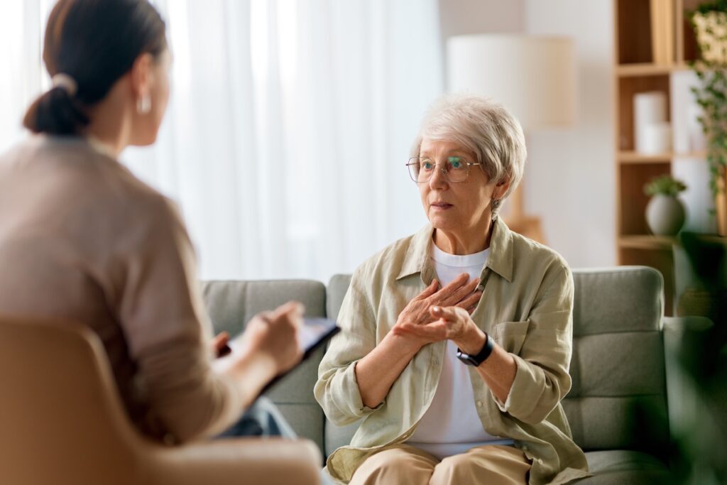 Consultation of senior female patient on reception for psychologist.